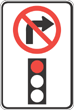 Panneau de signalisation - Virage à droite interdit au feu rouge.